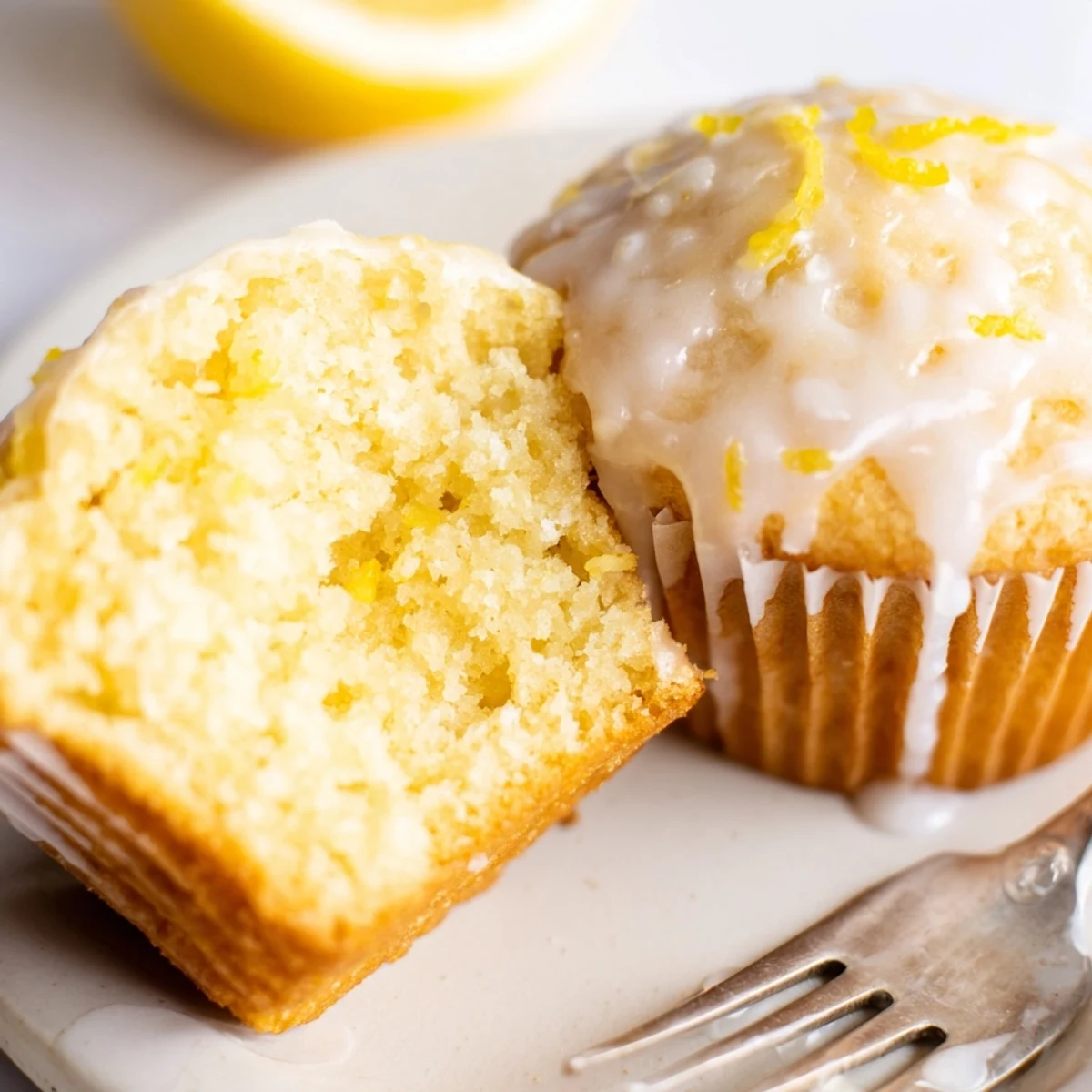 Glazed Lemon Ginger Muffins with glossy citrus glaze, steam rising, ready for breakfast