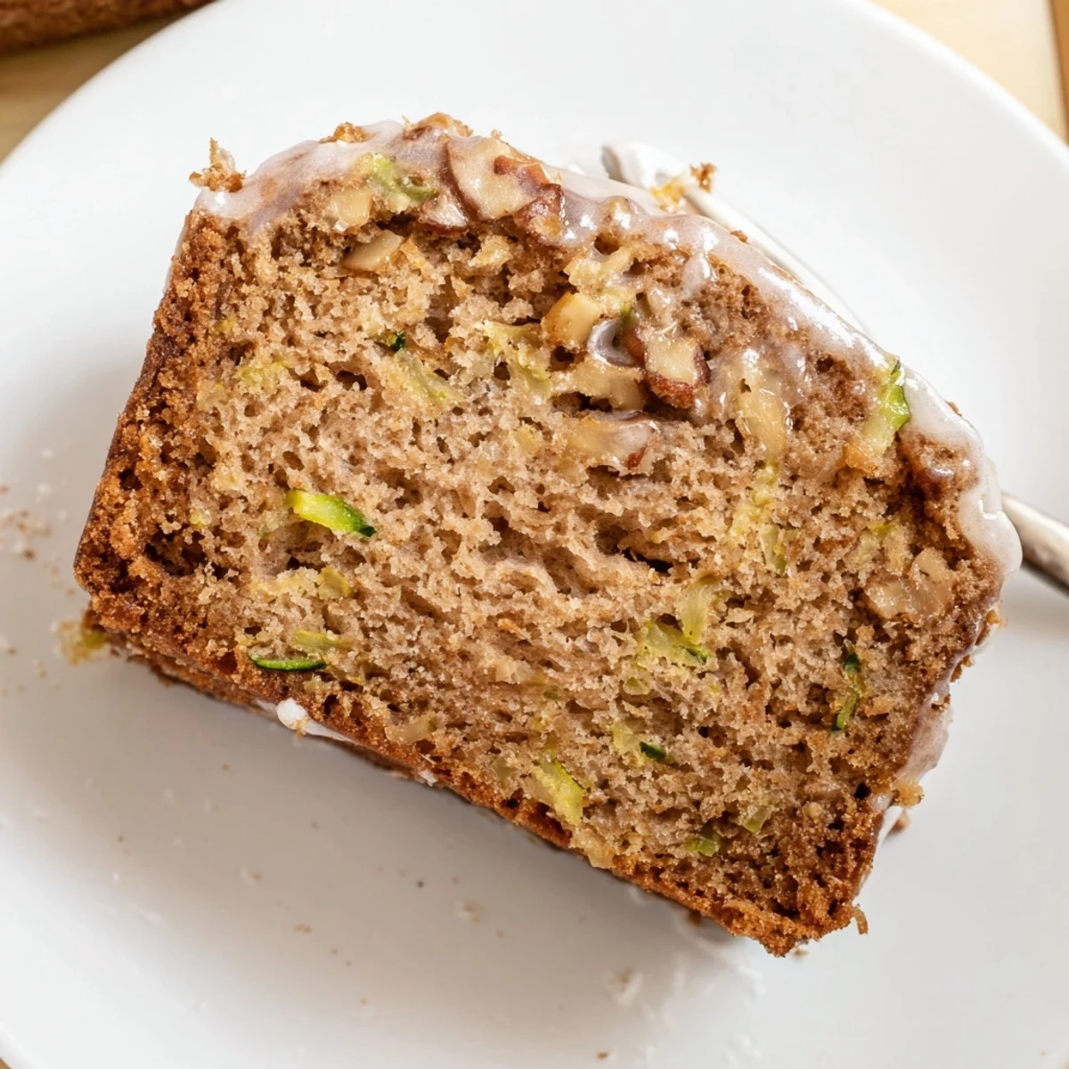 Serve warm Zucchini Cake With Brown Sugar Icing alongside afternoon coffee, comforting.